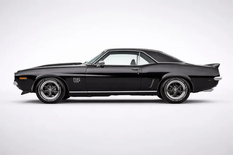 Full side profile exterior view of a 1969 Chevrolet Camaro SS showing the complete first-generation F-body proportions including the 108-inch wheelbase long hood short deck design with 186-inch overall length that defined the American muscle car aesthetic