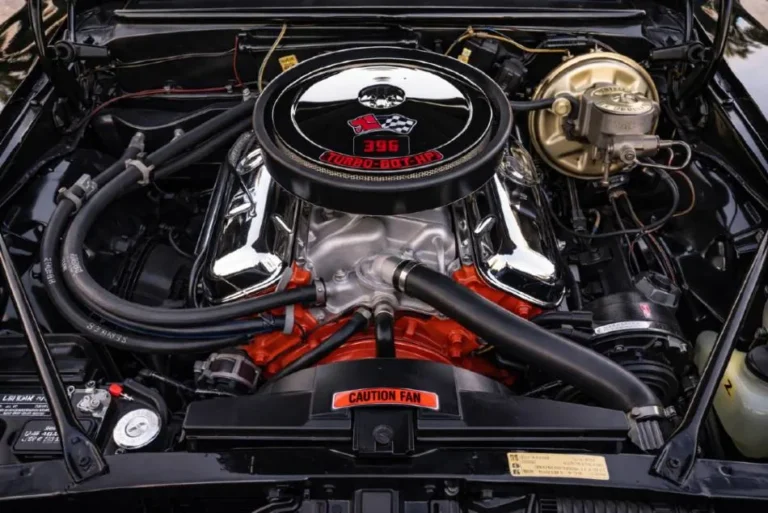 Engine bay of a 1969 Chevrolet Camaro SS 396 showing the correct factory big-block V8 with original air cleaner assembly and valve covers producing up to 375 horsepower in the L78 configuration