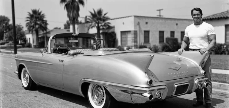 1957 Cadillac Eldorado Biarritz convertible the first significant luxury car purchased by Arnold Schwarzenegger after achieving early Hollywood success showing the dramatic chrome tailfins long hood and convertible body of the most celebrated American luxury car of the 1950s valued at approximately 89000 dollars in today's collector market and chosen by Schwarzenegger as a symbol of achieving the American Dream having arrived in the United States from Austria with very little and building one of the most successful careers in Hollywood history