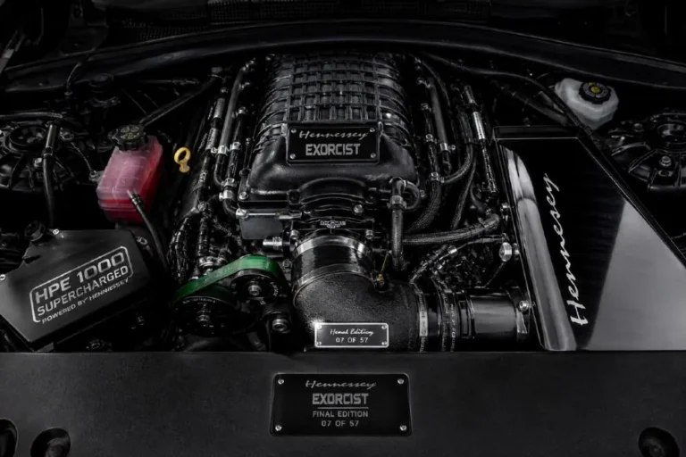 Hennessey Exorcist Camaro ZL1 engine bay showing the larger high flow supercharger upgrade operating at 14 psi boost pressure the HPE engine management components the oversized heat exchanger and the serial numbered Final Edition plaque reading Final Edition X of 57 commemorating 57 years of Camaro production in the 1000 horsepower 966 lb-ft of torque upgraded LT4 6.2 liter V8 that produces a 54 percent power increase over the stock 650 hp Camaro ZL1