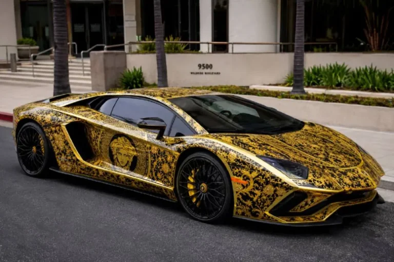 50 Cent's Versace-wrapped 2020 Lamborghini Aventador S showing the distinctive Versace pattern applied to the full exterior of the 730 horsepower 6.5 liter naturally aspirated V12 supercar reportedly wrapped to match a pair of Versace shoes reaching 60 mph in approximately 2.9 seconds with a top speed of 217 mph and a base price of approximately 421000 dollars making it the most talked about Lamborghini in 50 Cent's collection of four Lamborghinis also including the Aventador Roadster stolen by Snoop Dogg the Aventador SV and the Urus SUV