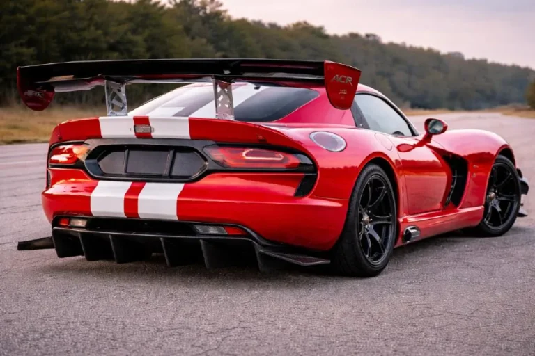  Close detail view of the Dodge Viper ACR Extreme Aero Package showing the massive carbon fiber rear wing on adjustable aluminum uprights front splitter and dive planes that generate approximately 1700 pounds of downforce at speed making the ACR the fastest production car around the Nurburgring in 2017