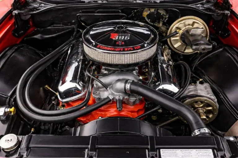 The L78 396 cubic inch big block V8 engine in a 1969 Chevelle SS engine bay producing 375 horsepower through a solid lifter valve train and 800 cfm Holley four barrel carburetor making it the most powerful mainstream engine option in the 1969 Chevelle SS lineup capable of quarter mile times in the 13.5 to 14.0 second range at trap speeds of 103 to 105 mph
