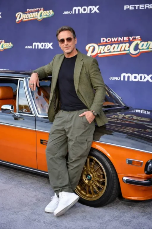 Robert Downey Jr. at the Downey's Dream Cars premiere at the Petersen Automotive Museum in Los Angeles June 2023 where he revealed he owns approximately 20 cars worth an estimated 13.5 million dollars and described his mission to convert classic vehicles to eco friendly powertrains through the FootPrint Coalition
