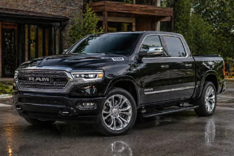 2026 Ram 1500 Limited four door Crew Cab pickup truck in three quarter front view showing the bright 20 inch wheels adaptive premium LED headlights power running boards additional chrome exterior trim dual chrome exhaust tips and the overall Limited-specific exterior presentation of the 540 horsepower High Output Hurricane twin turbo I6 powered luxury half ton truck that earned a spot on Car and Driver's 2026 10Best list and leads its segment in the JD Power 2026 Vehicle Dependability Study
