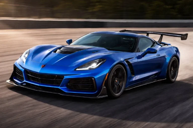 Chevrolet Corvette ZR1 equipped with the ZTK Performance Package showing the large adjustable carbon fiber rear wing front dive planes Gurney lip on the flow through hood and Michelin Pilot Sport Cup 2 R tires generating over 1200 pounds of downforce at speed while reducing top speed from 233 mph to 215 mph in exchange for substantially improved cornering grip and lap times at racing circuits