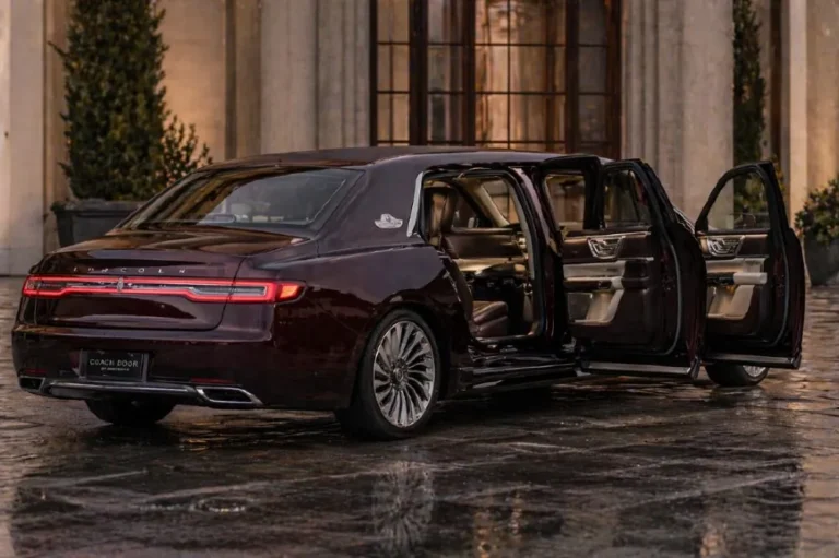 2019 Lincoln Continental 80th Anniversary Coach Door Edition showing the rear hinged coach doors open at 90 degrees the 6 inch wheelbase extension added by Cabot Coach Builders in Massachusetts and the more formal squared off greenhouse resulting from the stretch with only 80 units produced numbered 1 to 80 each powered by the 400 horsepower 3.0 liter twin turbo V6 with torque vectoring AWD priced north of 100000 dollars and sold out before deliveries began in June 2019