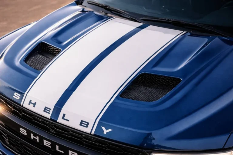 Close-up detail of the F-150 Shelby Super Snake Sport dual-intake Ram Air hood showing two functional air intake nostrils that channel outside air directly to the Whipple supercharger on the 5.0-liter Coyote V8