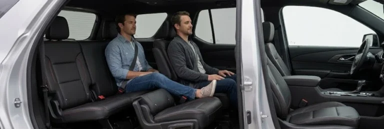 2026 Chevrolet Traverse third row interior showing 32 inches of legroom that accommodates adult passengers comfortably making it one of the most usable third rows in the midsize three-row SUV class with second-row captain's chairs standard across all four trims and a second-row bench seat available on the LT trim only for eight-passenger capacity with the RS and High Country offering power-folding third-row access