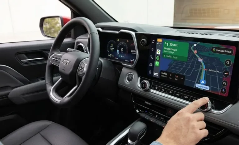 2026 Chevrolet Colorado interior showing the 11.3-inch center touchscreen with Google Built-in functionality wireless Apple CarPlay and Android Auto and the 11-inch digital Driver Information Center standard across all five trims from the 34495 dollar WT Work Truck through the ZR2 representing one of the largest standard infotainment screens in the midsize truck segment alongside over-the-air software update capability and Chevy Safety Assist active safety suite