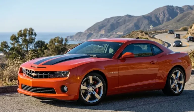 Fifth generation Chevrolet Camaro SS from 2010 to 2015 showing the retro design inspired by the 1969 first generation Camaro with twin stripe hood round headlights and muscular shoulder line produced on the Zeta platform after the seven year production gap from 2003 to 2009 following the first discontinuation available with the 6.2 liter LS3 V8 producing 426 horsepower in SS configuration