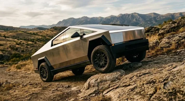 2026 Tesla Cybertruck showing the stainless steel exoskeleton and geometric angular body design with up to 16 inches of ground clearance and the Cyberbeast tri-motor configuration achieving 60 mph in 2.6 seconds with 11000 pounds of maximum towing capacity representing the most distinctive and polarizing electric pickup truck design in the current market with native Tesla Supercharger network access