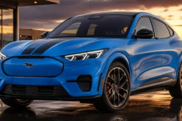 Ford Mustang Mach-E in three-quarter front view showing the LED headlight signature and crossover SUV proportions of the electric compact SUV available in Select Premium GT and Rally trims from 37795 to 57690 dollars producing 264 to 480 horsepower with 240 to 320 miles of range Tesla Supercharger network access and IIHS Top Safety Pick Plus recognition with the GT trim specifically producing 480 horsepower and reaching 60 mph in approximately 3.5 seconds with Brembo front brakes as standard