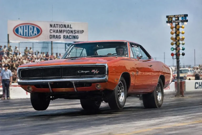 1970 Dodge Charger R/T at a drag strip showing the period performance context for the Road and Track package with the 440 Magnum V8 producing 375 horsepower running the quarter mile in 13.9 seconds at 101.4 mph according to period documentation or with the 440 Six Pack at 390 horsepower or the 426 Street Hemi at 425 horsepower representing the three performance engine options available to buyers who checked the R/T package in 1970 against competition including the Chevrolet Chevelle SS 454 Plymouth Road Runner and Ford Mustang Boss 429