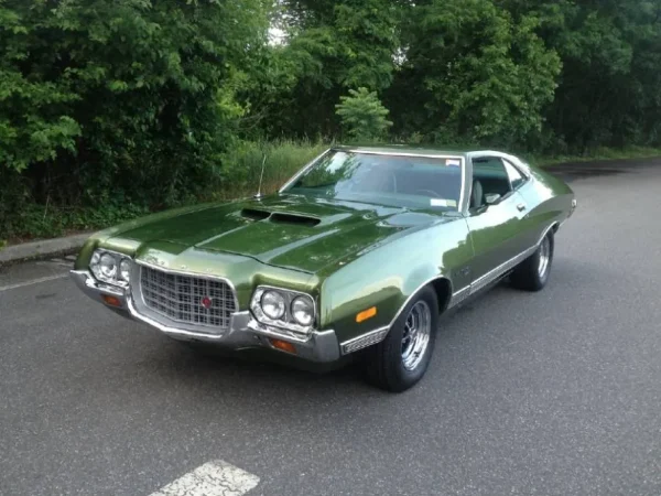 1972 Ford Gran Torino parked on the side of a road