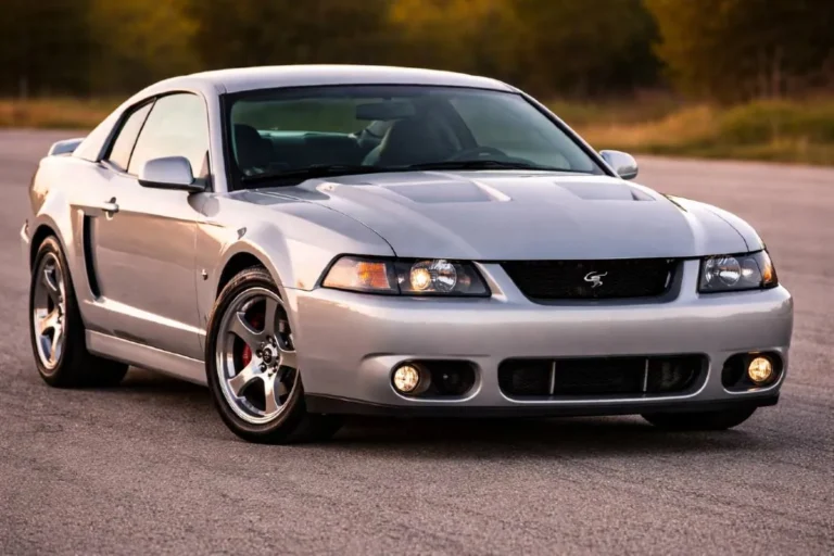 2003 Ford Mustang SVT Cobra Terminator showing the functional hood heat extractors Cobra badge and New Edge styling of the officially 390 horsepower supercharged Mustang that independent testing confirmed was producing approximately 500 horsepower at the crank achieving quarter mile times of 12.9 seconds that were inconsistent with the factory rating